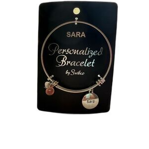 Swibco Personalized Bracelet featuring the name "Sara"